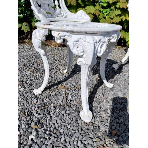 36 - 19th C. cast iron garden table with three matching chairs {Tbl. 68 cm H x 59 cm Dia. and Chairs 83 c... 