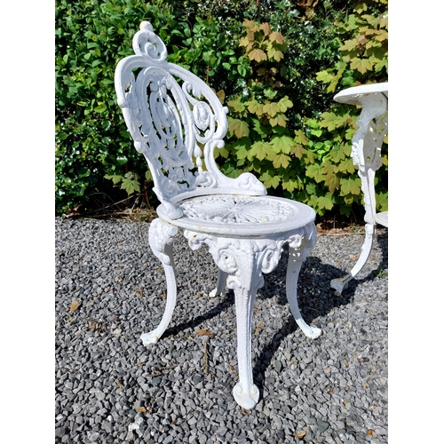 36 - 19th C. cast iron garden table with three matching chairs {Tbl. 68 cm H x 59 cm Dia. and Chairs 83 c... 