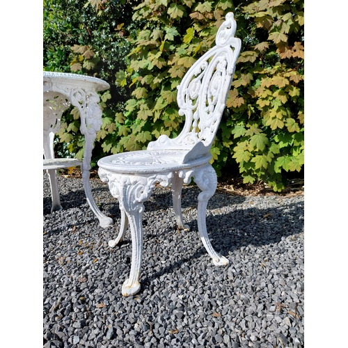 36 - 19th C. cast iron garden table with three matching chairs {Tbl. 68 cm H x 59 cm Dia. and Chairs 83 c... 