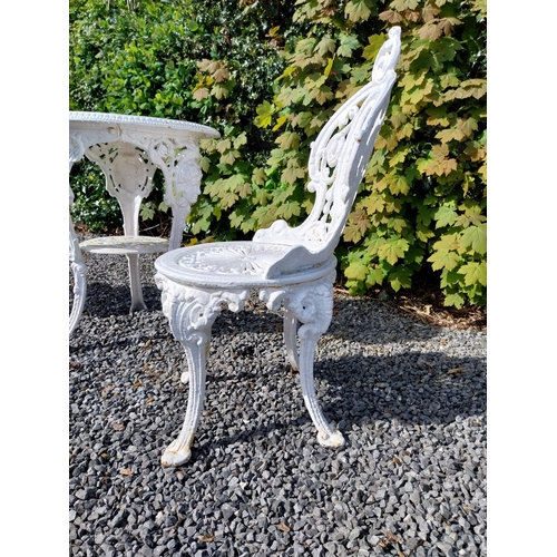 36 - 19th C. cast iron garden table with three matching chairs {Tbl. 68 cm H x 59 cm Dia. and Chairs 83 c... 