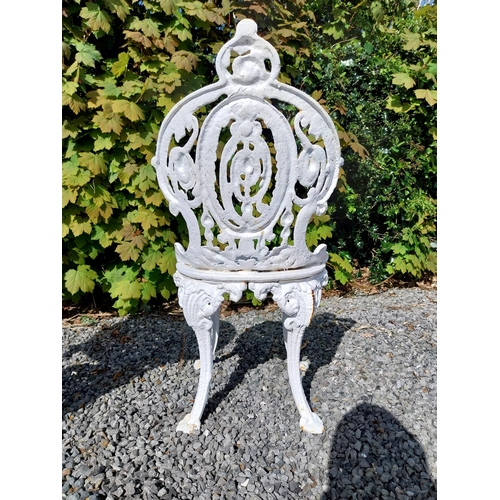 36 - 19th C. cast iron garden table with three matching chairs {Tbl. 68 cm H x 59 cm Dia. and Chairs 83 c... 