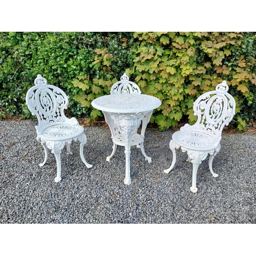 36 - 19th C. cast iron garden table with three matching chairs {Tbl. 68 cm H x 59 cm Dia. and Chairs 83 c... 