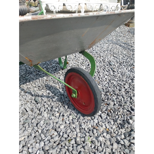 379 - Galvanised metal child's wheel barrow {39 cm H x 57 cm W x 93 cm D}. (NOT AVAILABLE TO VIEW IN PERSO... 