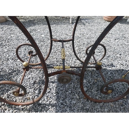 380 - Good quality wrought iron and brass butchers table with marble top {76 cm H x 120 cm W x 60 cm D}.