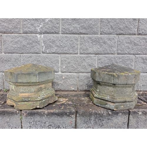 385 - Pair of stone pier caps{H 35cm x 46 x 46 }. (NOT AVAILABLE TO VIEW IN PERSON)