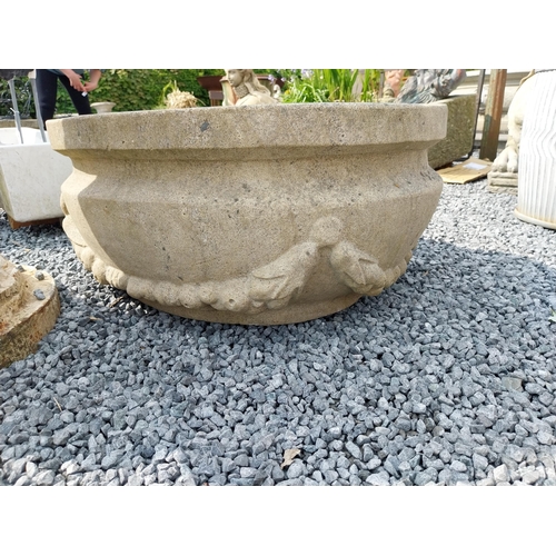 387 - Good quality carved sandstone planter decorated with swags {37 cm H x 80 cm W x 61 cm D}.