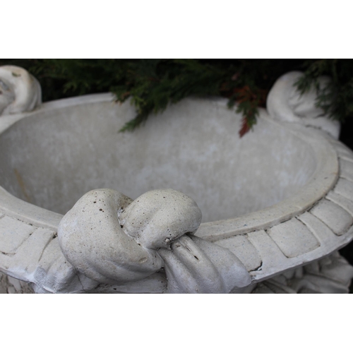 389 - Pair of composite stone urns decorated with swags and tails- bases not included {}. (NOT AVAILABLE T... 