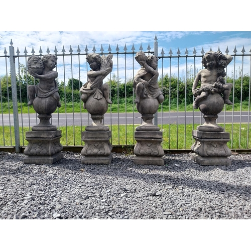 400 - Set of four good quality moulded stone statues of Cherubs depicting the four seasons raised on pedes... 