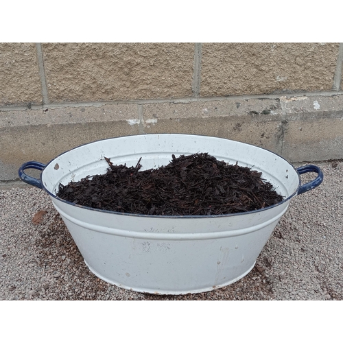 423 - Enamel planter with handles {H 25cm x W 74cm x D 47cm }. (NOT AVAILABLE TO VIEW IN PERSON)