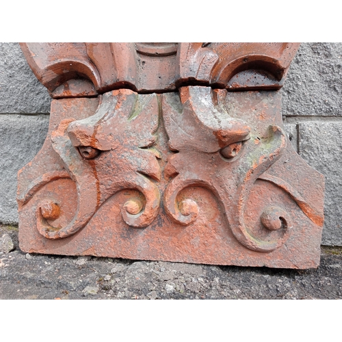 43 - Terracotta wall frieze with scroll design {H 62cm x W 48cm x D 21cm }.