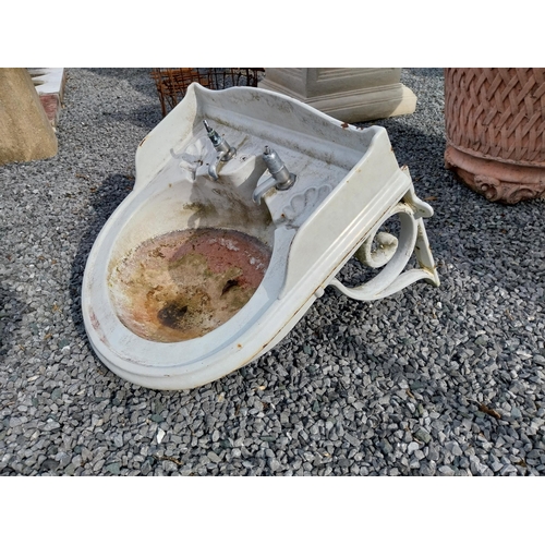 444 - Early 20th C. enamel sink with original cast iron wall bracket {56 cm H x 65 cm W x 65 cm D}.