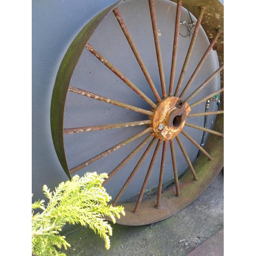 448 - Pair of early 20th C. wrought iron machine wheels {23 cm D x 167 cm Dia.}.