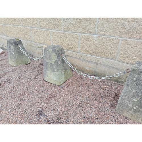 45 - Three stone bollards with chain {Each H 40cm x 26 x 26 }. (NOT AVAILABLE TO VIEW IN PERSON)