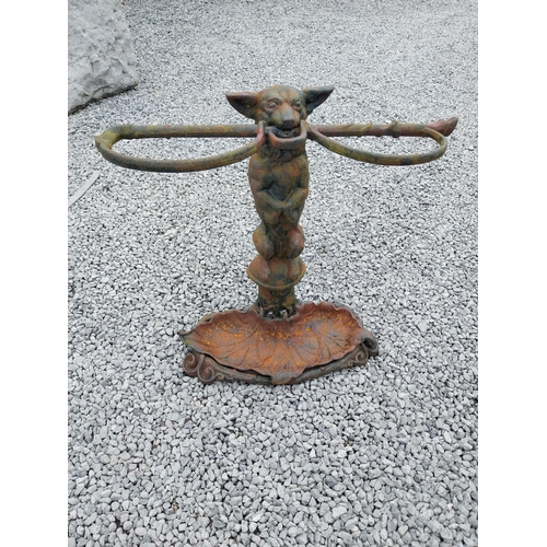 460 - Cast iron stick stand depicting a dog in the Coalbrookdale style {58 cm H x 60 cm W x 20 cm D}.