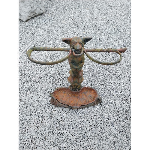 460 - Cast iron stick stand depicting a dog in the Coalbrookdale style {58 cm H x 60 cm W x 20 cm D}.