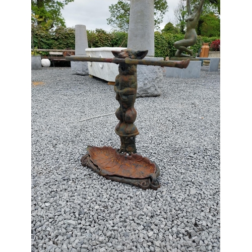 460 - Cast iron stick stand depicting a dog in the Coalbrookdale style {58 cm H x 60 cm W x 20 cm D}.