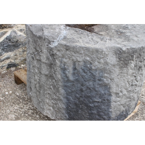 47 - 19th C. Kilkenny mill stone {H 48cm x Dia 76cm}.