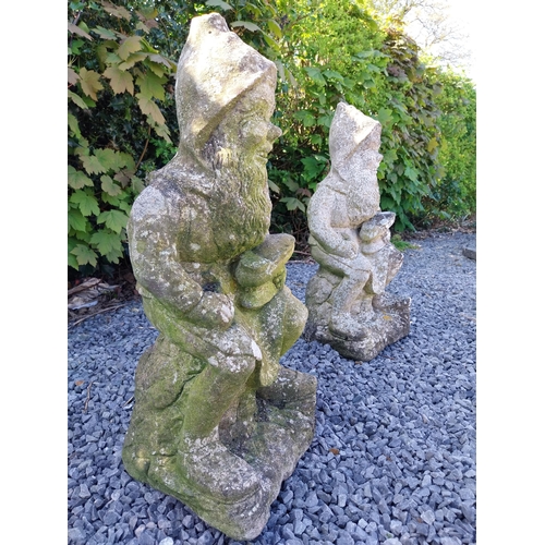 482 - Pair of early 20th C. composition statues of Gnomes {63 cm H x 28 cm W x 26  cm D}.