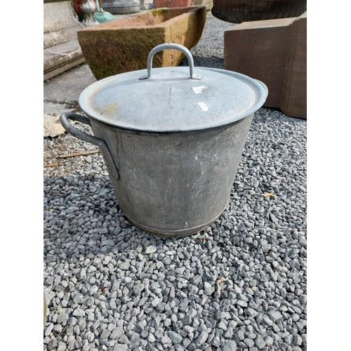 484 - Two early 20th C. galvanised lidded pots {40 cm H x 49 cm Dia. and 50 cm H x 37 cm Dia.}.