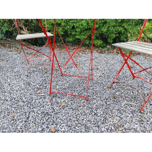 485 - Metal and wooden garden table with two matching chairs {Tbl. 71 cm H x 60 cm Dia. and 82 cm H x 38 c... 