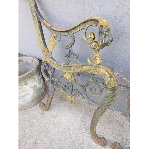 490 - Pair of decorative cast iron seat ends {74 cm H x 66 cm W}.