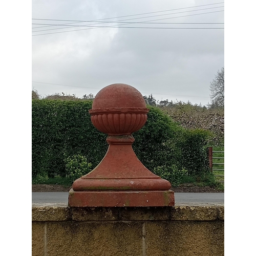 513A - Two terracotta pier caps ball tops {H 65cm x 45 x 45}. (NOT AVAILABLE TO VIEW IN PERSON)