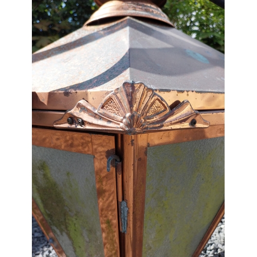 524 - Good quality copper wall lantern with wrought iron bracket {129 cm H x 94 cm W x 54 cm D}.