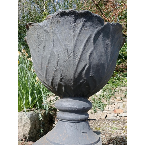 529 - Pair of cast iron urns raised on sandstone pedestal {H 67cm x Dia 60cm }. (NOT AVAILABLE TO VIEW IN ... 