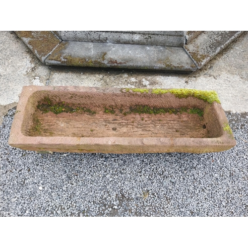 530 - Good quality carved red sandstone trough {30 cm H x 140 cm W x 45 cm D}.