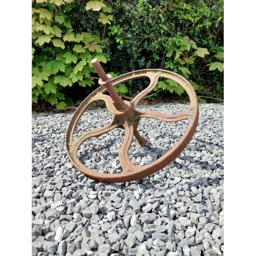 544 - Metal watering can and cast iron wheel barrow wheel {39 cm H x 49 cm W x 26 cm D and 36 cm W x 39 cm... 