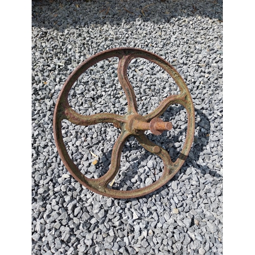 544 - Metal watering can and cast iron wheel barrow wheel {39 cm H x 49 cm W x 26 cm D and 36 cm W x 39 cm... 