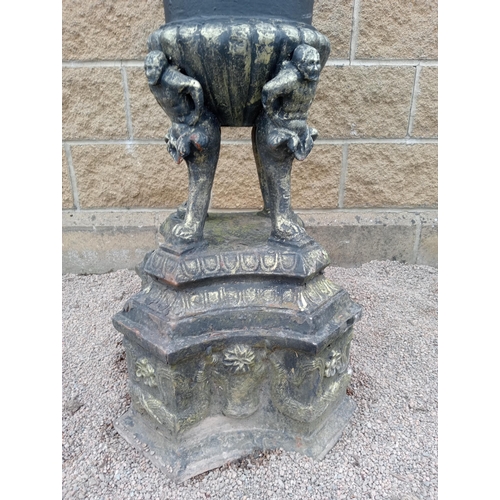 549 - Pair of cast iron urns {H 110cm x W 46cm x D 46cm }. (NOT AVAILABLE TO VIEW IN PERSON)