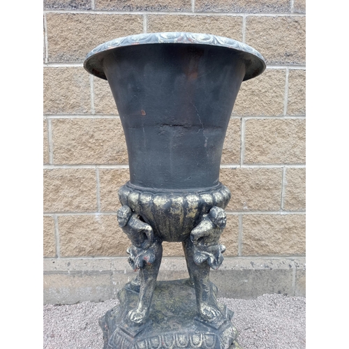 549 - Pair of cast iron urns {H 110cm x W 46cm x D 46cm }. (NOT AVAILABLE TO VIEW IN PERSON)