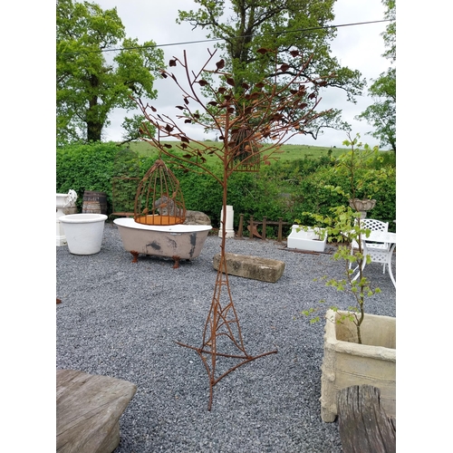 559 - Decorative wrought iron bird feeder in the form of a tree and two hanging bird cages {224 cm H x 135... 