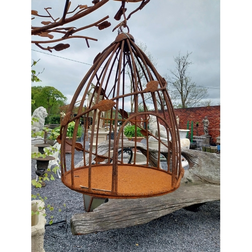 559 - Decorative wrought iron bird feeder in the form of a tree and two hanging bird cages {224 cm H x 135... 