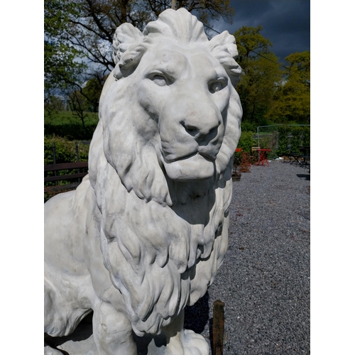 569 - Pair of good quality moulded stone statues of seated Lions raised on pedestals {185 cm H x 123 cm W ... 