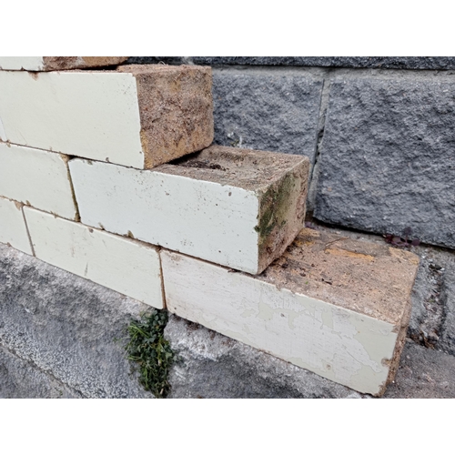 57 - Collection of one hundred white glazed bricks {H 8cm x W 23cm x D 11cm }.