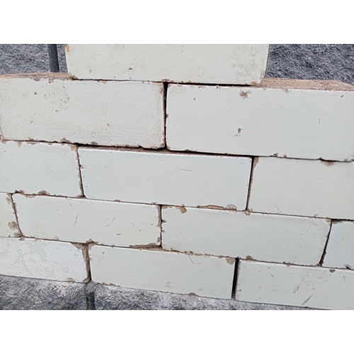 57 - Collection of one hundred white glazed bricks {H 8cm x W 23cm x D 11cm }.