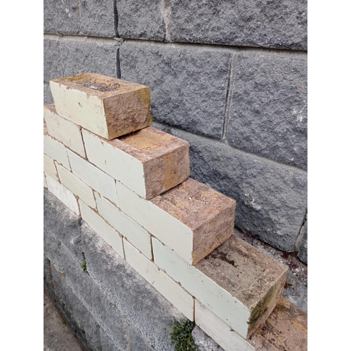 57 - Collection of one hundred white glazed bricks {H 8cm x W 23cm x D 11cm }.