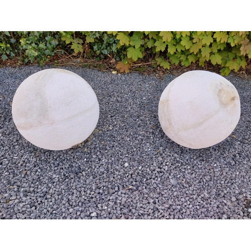 572 - Pair of moulded stone garden spheres {42 cm Dia.}.