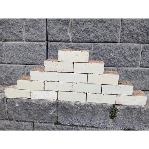 57A - Collection of one hundred white glazed bricks {H 8cm x W 23cm x D 11cm }. (NOT AVAILABLE TO VIEW IN ... 