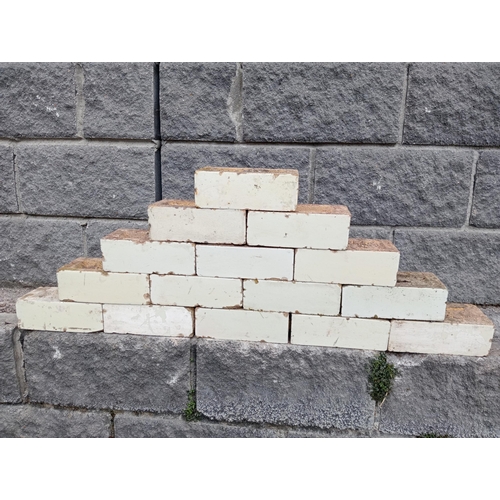 57B - Collection of one hundred white glazed bricks {H 8cm x W 23cm x D 11cm }. (NOT AVAILABLE TO VIEW IN ... 