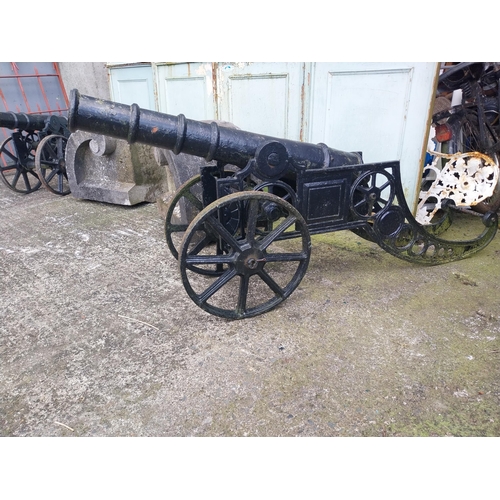 586 - Pair of decorative cast iron cannons in the Victorian style {71 cm H x 42 cm W x 160 cm D}.