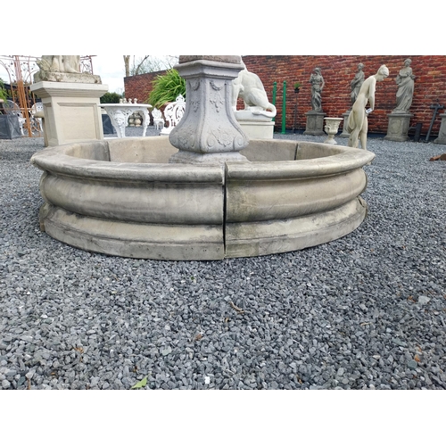 588 - Moulded stone flower bed surround {39 cm H x 200 cm Dia.}. Plus an urn decorated with swags and a gr... 