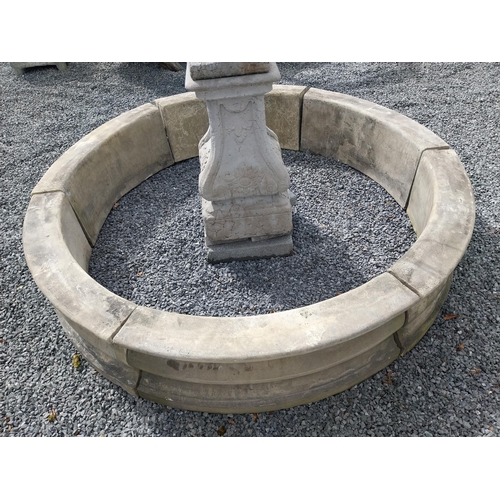 588 - Moulded stone flower bed surround {39 cm H x 200 cm Dia.}. Plus an urn decorated with swags and a gr... 