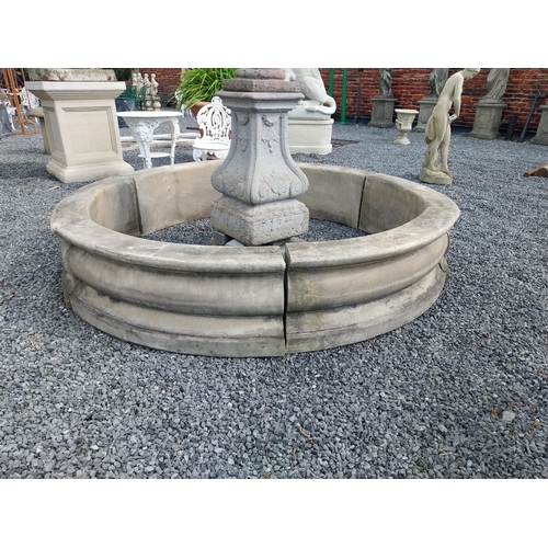 588 - Moulded stone flower bed surround {39 cm H x 200 cm Dia.}. Plus an urn decorated with swags and a gr... 