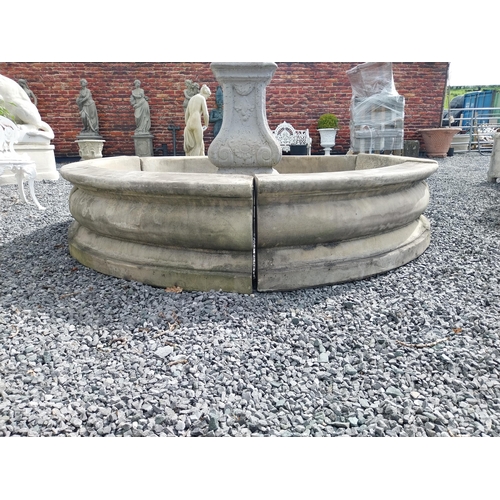 588 - Moulded stone flower bed surround {39 cm H x 200 cm Dia.}. Plus an urn decorated with swags and a gr... 