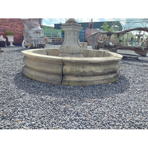 588 - Moulded stone flower bed surround {39 cm H x 200 cm Dia.}. Plus an urn decorated with swags and a gr... 