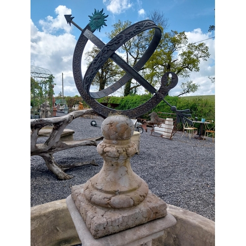 589 - Bronze armillary sundial raised on moulded stone pedestal {150 cm H x 42 cm W x 42 cm D}