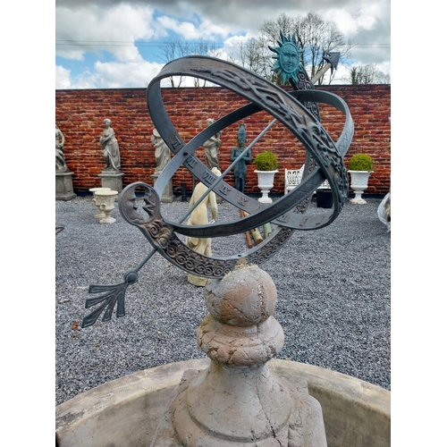 589 - Bronze armillary sundial raised on moulded stone pedestal {150 cm H x 42 cm W x 42 cm D}